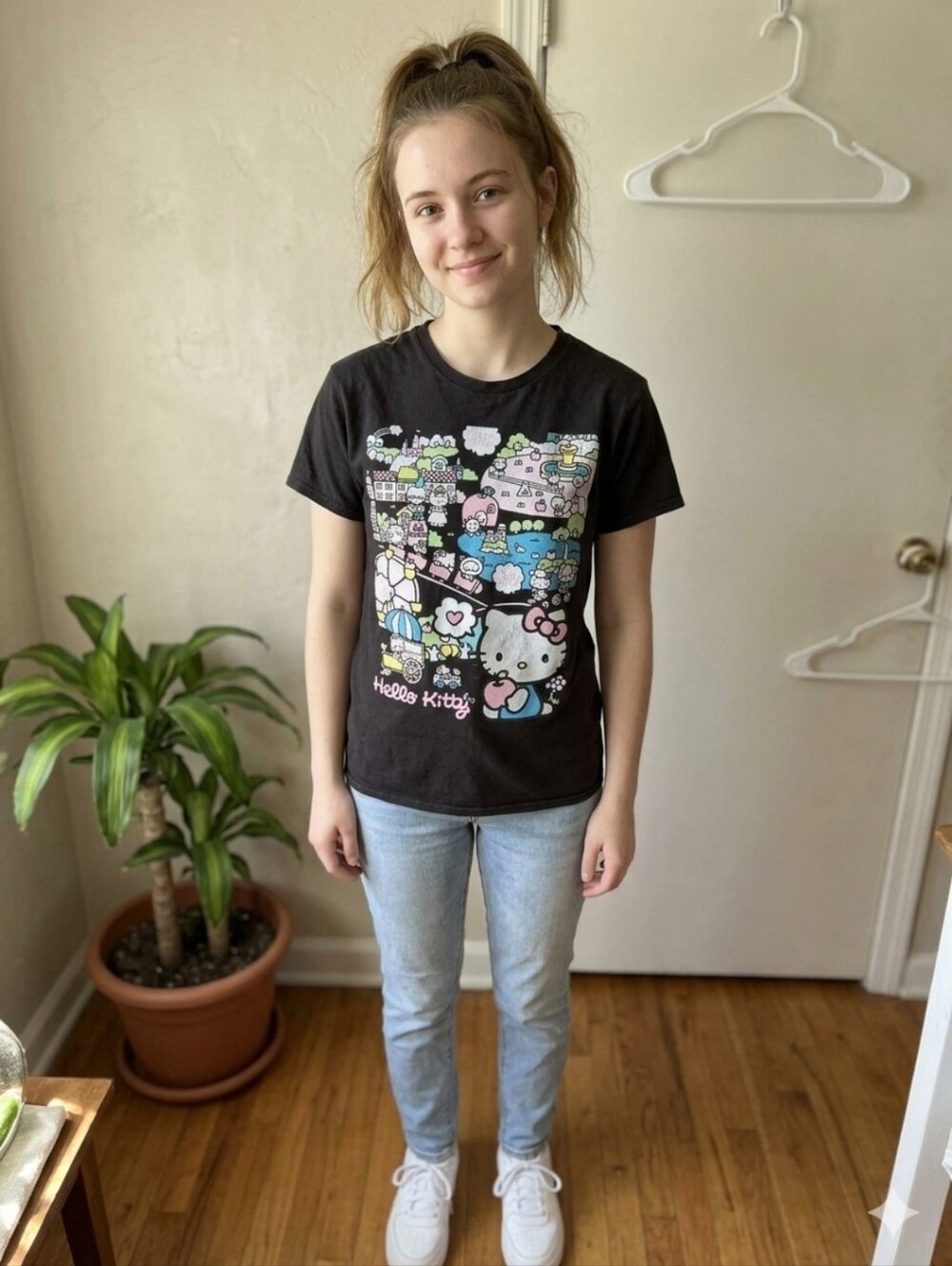 Hello Kitty Black Graphic Tee with Pastel Pink & Blue Accents